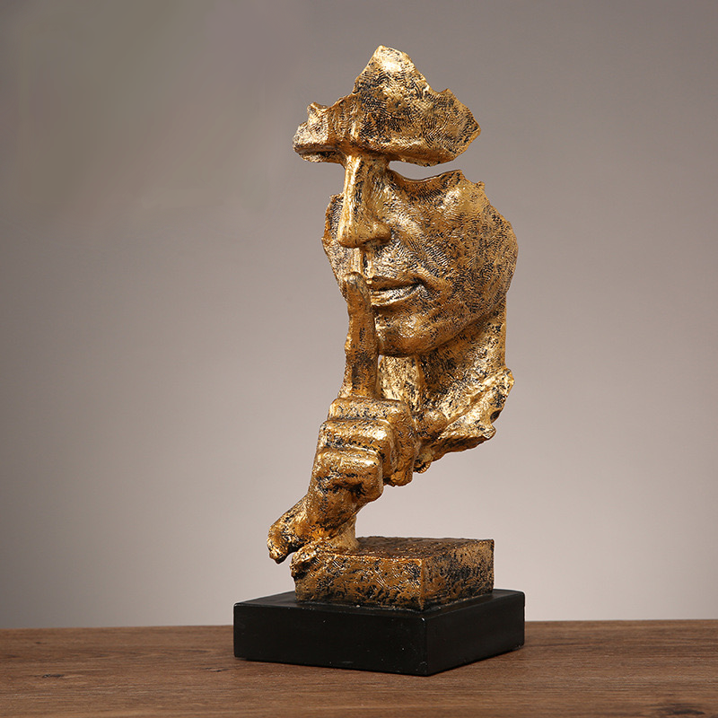 The 'Speak No Evil' Gold Statue