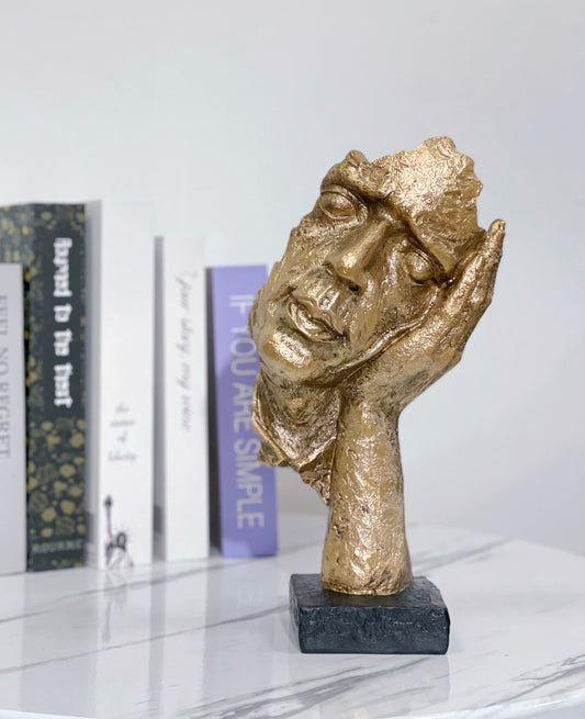 The 'Hear No Evil' Gold Statue